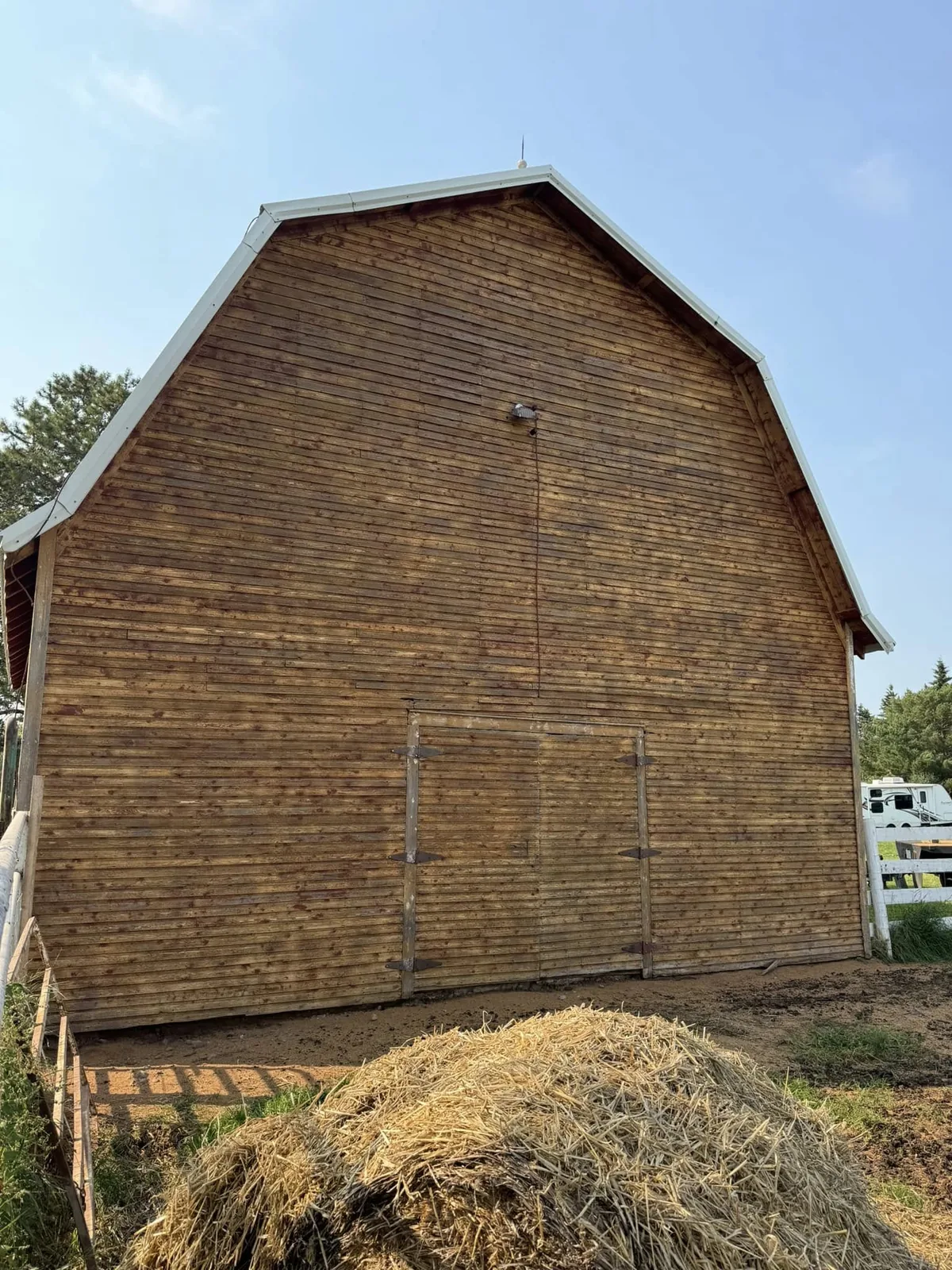 Barn face fully stripped to clean original wood grain, boards undamaged